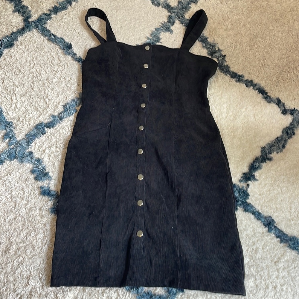 Black corduroy button up dress.